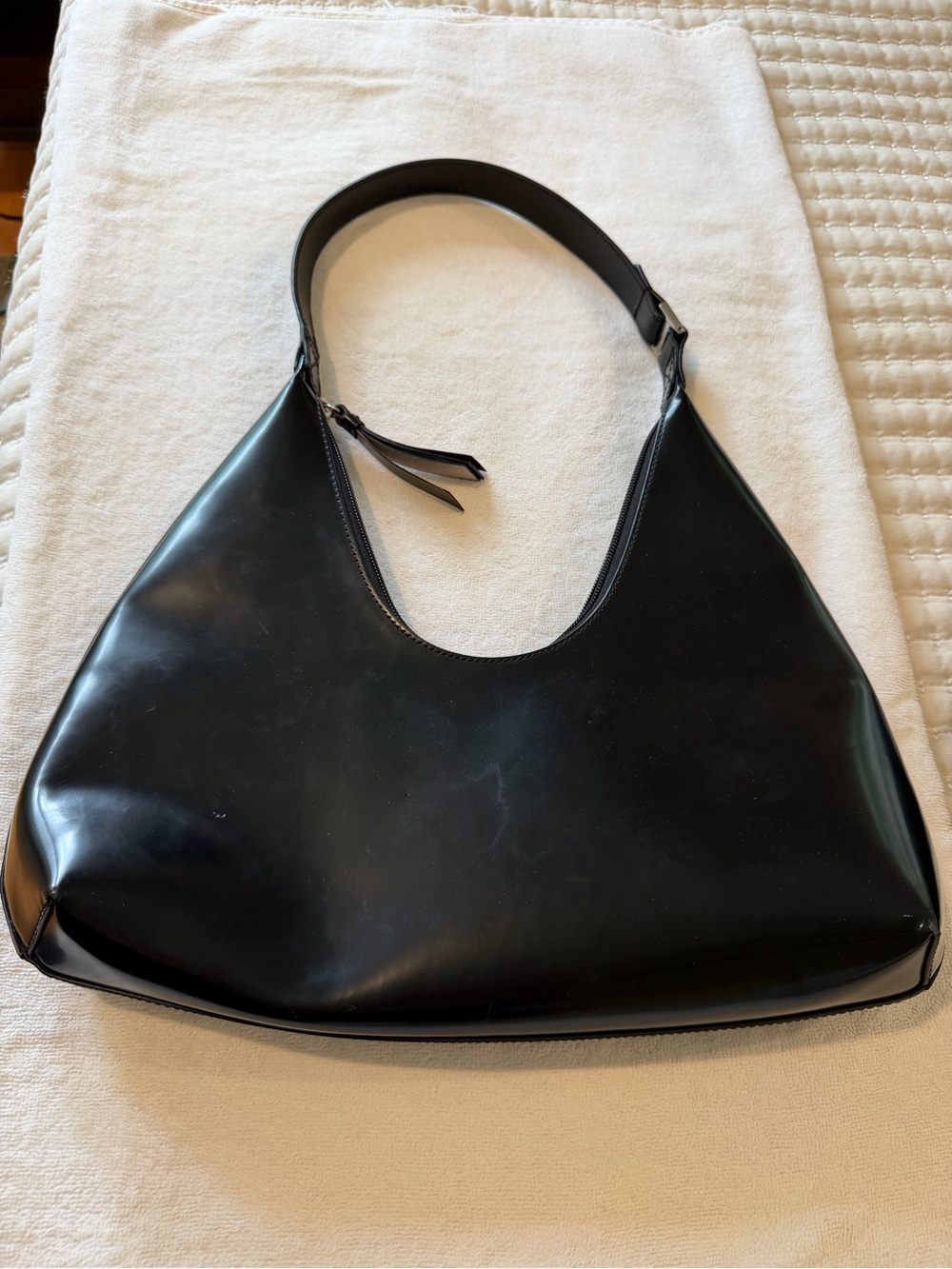By FAR AMBER Black Patent Crescent Shoulder Bag
